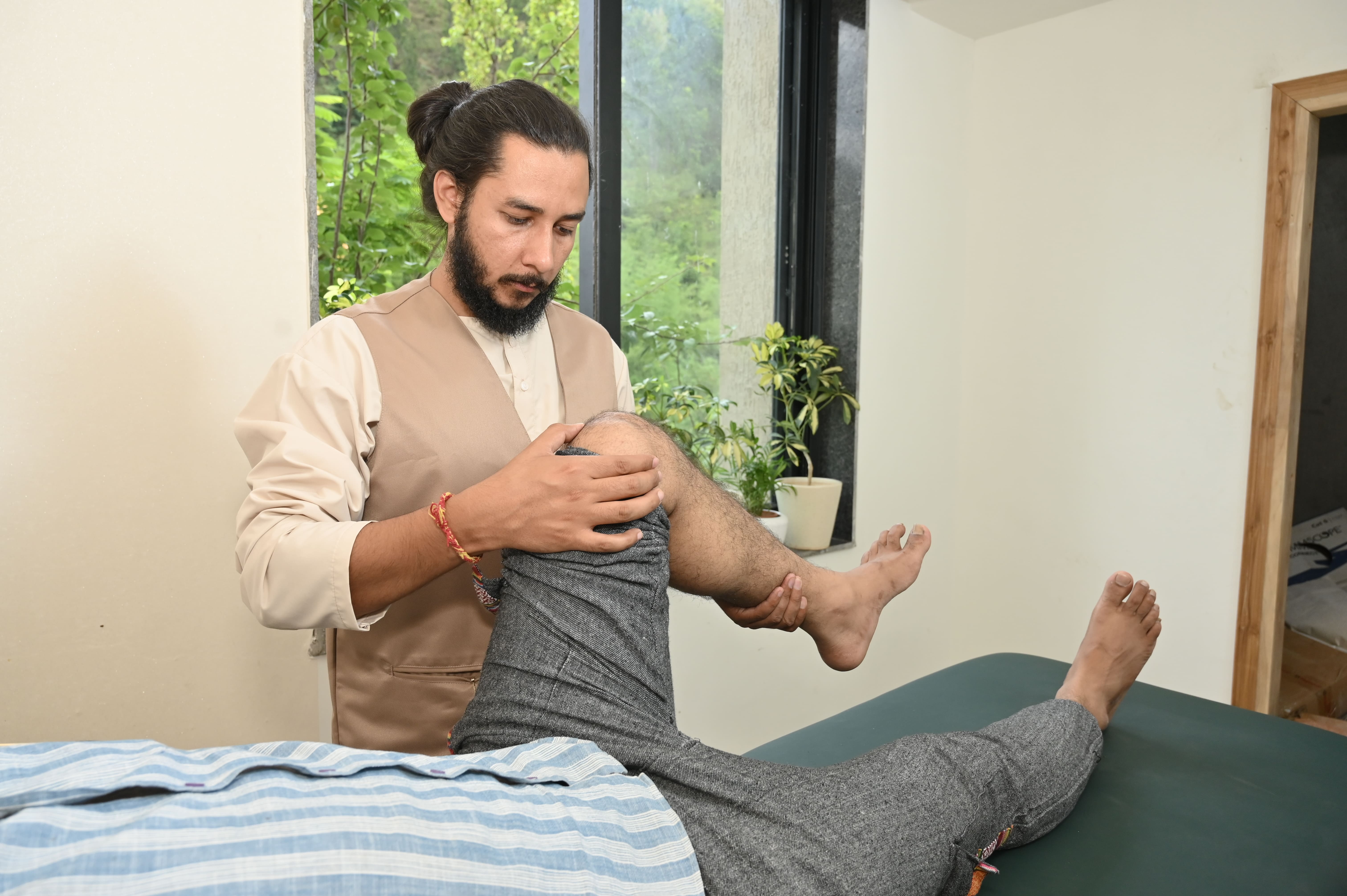 Primary Physiotherapy Suite featuring structural realignment beds and diagnostic space